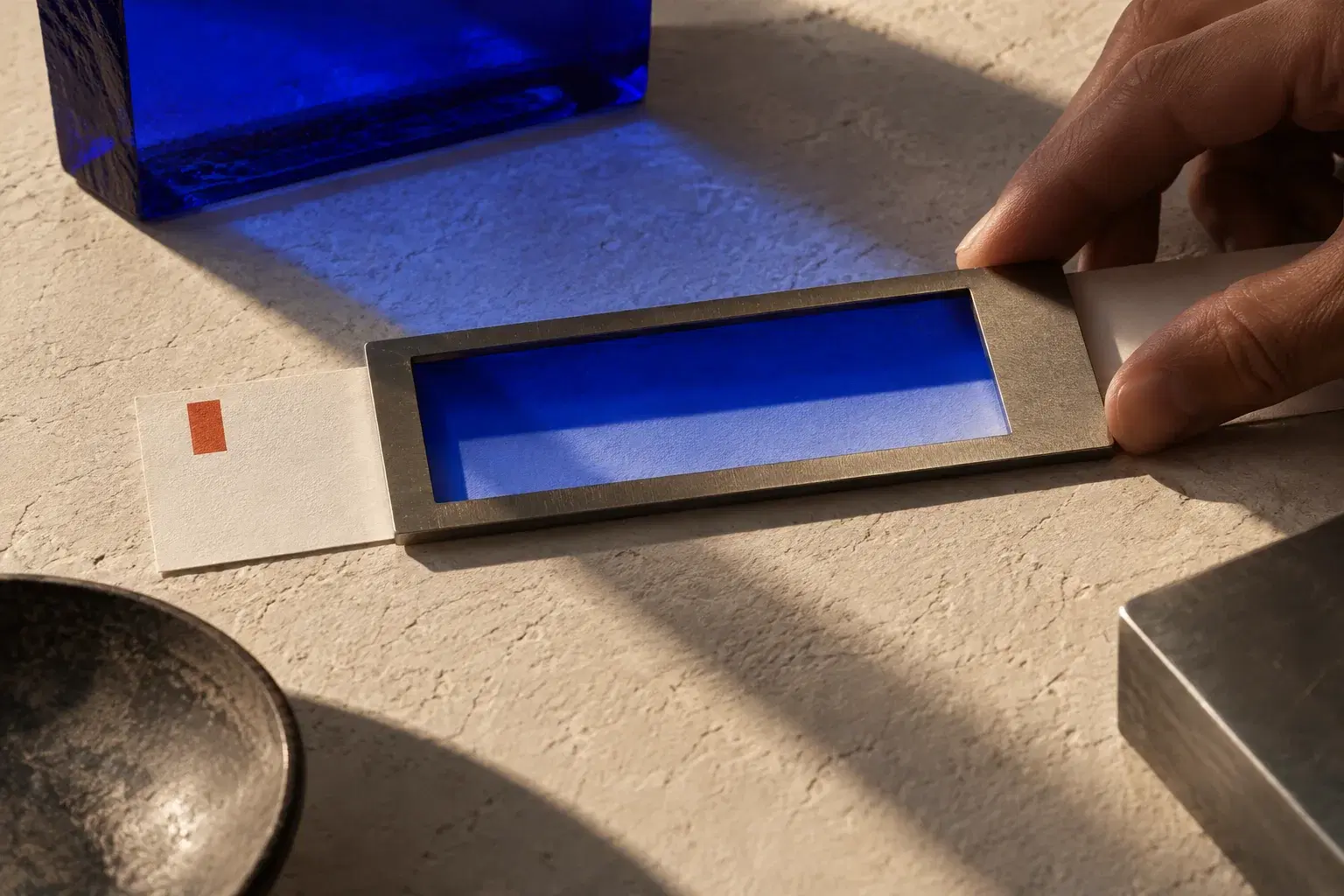 A paper strip viewed through a blue editing frame